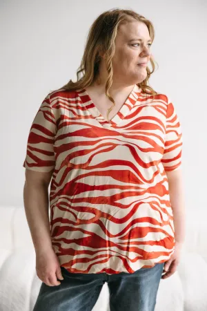 BREEZY BANDED HEM BLOUSE IN ABSTRACT PRINT