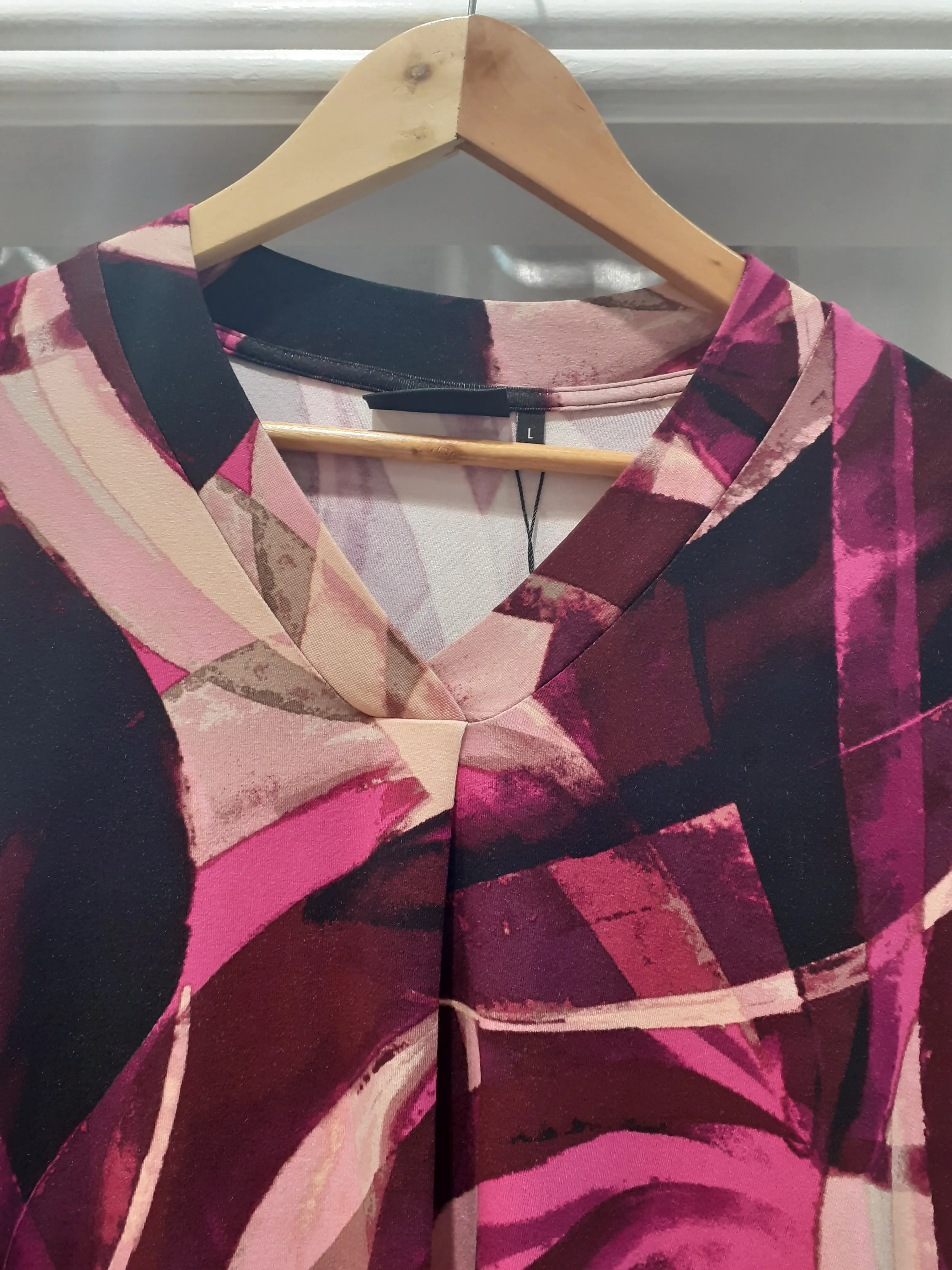 Signature abstract V neckline tops